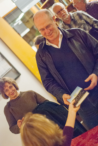 Photo of Kristin Ohlson greeting guests at Powell's - Photo by Kristin Beadle